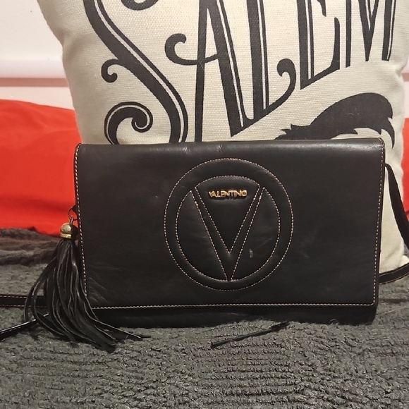 Valentino Handbags - Valentino Black Leather Clutch with Tassel Accent